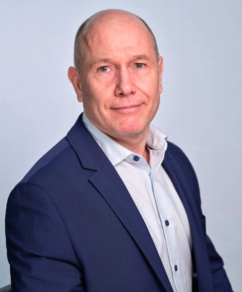A headshot of Danny Sims, co-founder of TruStrata